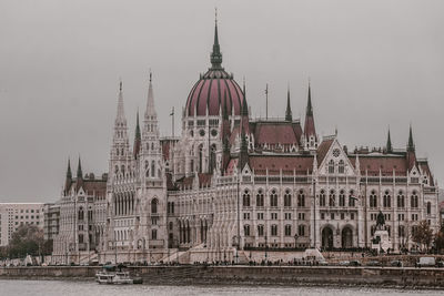 View of buildings in city against sky