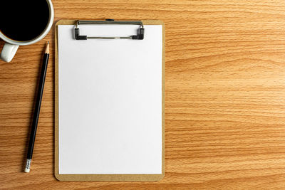 High angle view of coffee cup on table