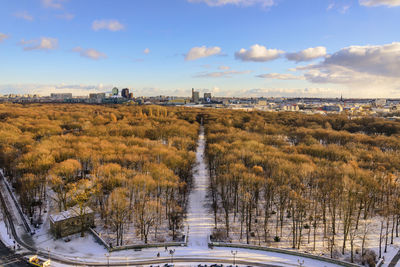 Scenic view of field against sky during winter