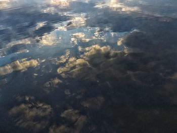 Aerial view of sea and landscape during sunset