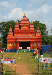 View of temple against building
