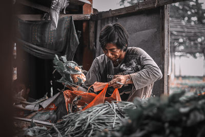 Young man working at construction site