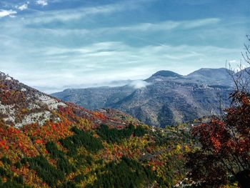 Scenic view of mountains against sky during autumn