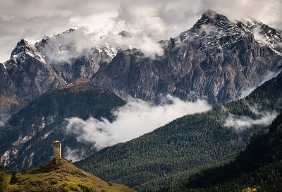 Scenic view of majestic mountains against sky