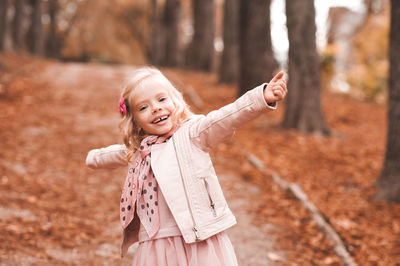 Cute girl having fun in public park