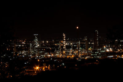 Illuminated cityscape at night