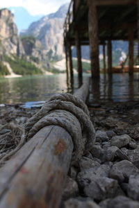 Close-up of rope on riverbank