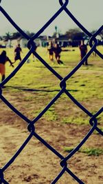 Full frame shot of chainlink fence against sky