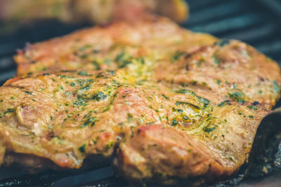 Close-up of meat on barbecue grill