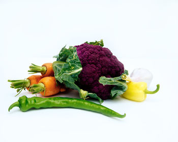 Close-up of vegetables against white background