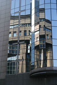 Low angle view of modern building against clear sky