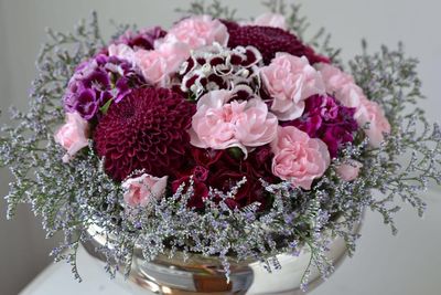 Close-up of pink flower on table