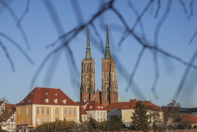 View of buildings in city against sky