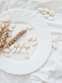 High angle view of white chocolate in plate on table