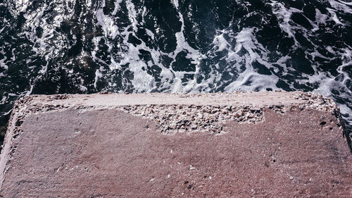 Close-up of rock at beach