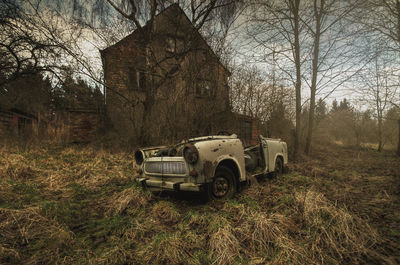 Built structure against bare trees
