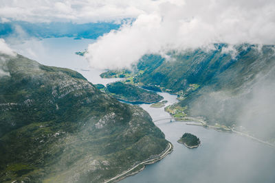 Aerial view of mountain by sea