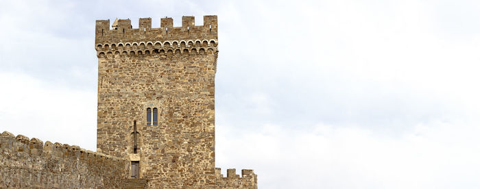 Low angle view of historic building against sky