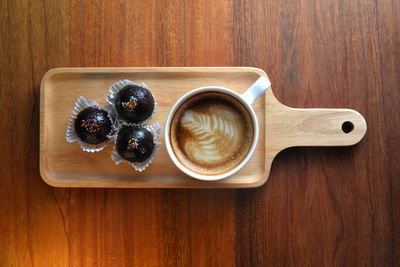 High angle view of coffee cup on table