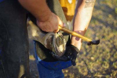 Midsection of man working