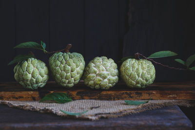 Custard apples on wooden table