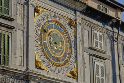 Low angle view of clock tower on building