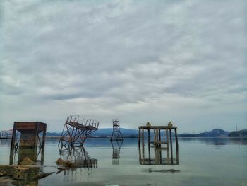 Pier over sea against sky