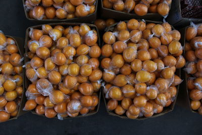 High angle view of onions for sale at market stall