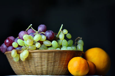 Close-up of grapes in basket