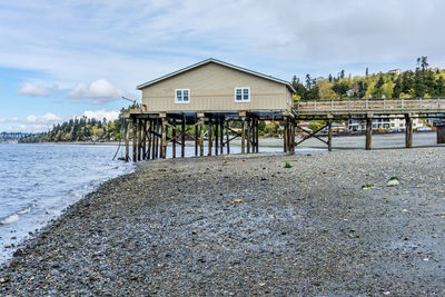 A pier at redondo beach, washington at low tide.