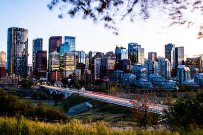 Modern buildings in city against sky