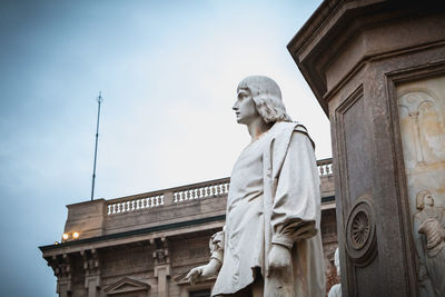 Low angle view of statue against sky