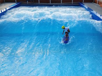 High angle view of person in swimming pool