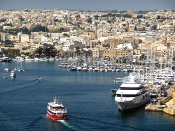 Boats sailing in sea