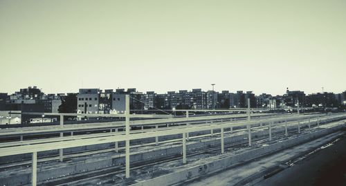 Railroad tracks against clear sky