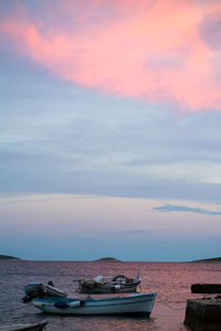 Scenic view of sea against sky at sunset