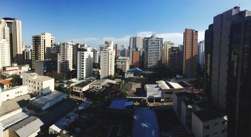 High angle view of buildings in city against sky