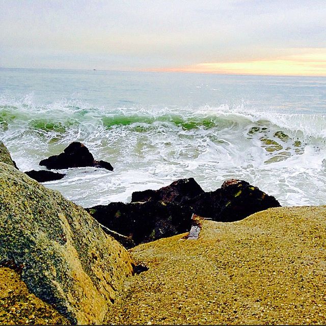 SCENIC VIEW OF SEA DURING SUNSET