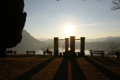 Scenic view of silhouette mountains against sky during sunset