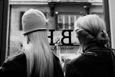 Rear view of woman wearing hat