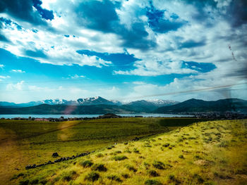 Scenic view of field against sky