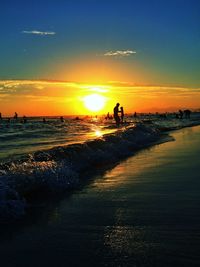 Scenic view of sea at sunset