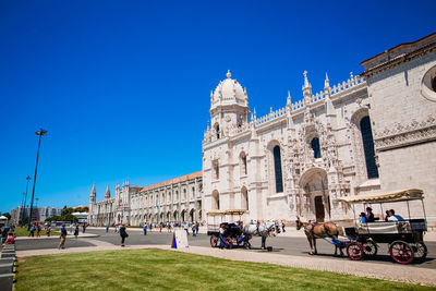 Group of people in front of historical building