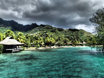 Scenic view of sea against cloudy sky