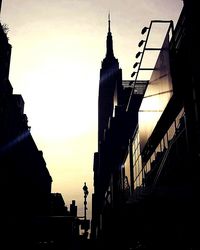 Silhouette of buildings at sunset