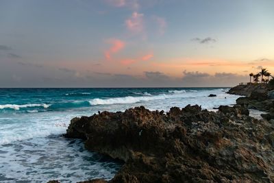 Scenic view of sea against sky during sunset