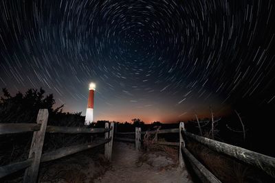 Scenic view of sea against sky at night