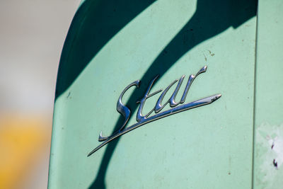 High angle view of eyeglasses on table against wall