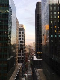 Modern cityscape against sky