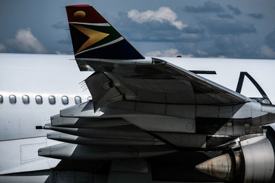 Low angle view of airplane against sky